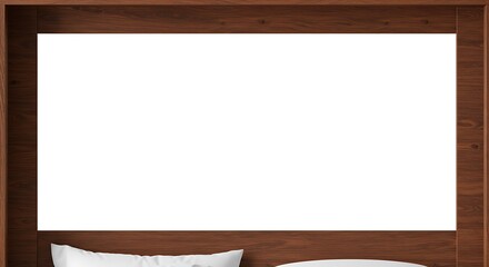 A bed with white pillows and sheets is framed by a dark wooden headboard. The center is a blank white space.