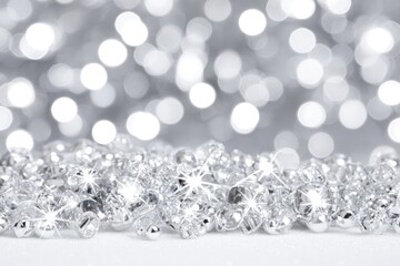 Sparkling silver gems against a soft bokeh background