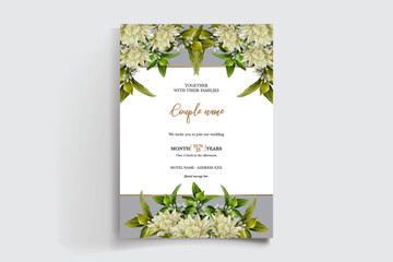 WEDDING INVITATION FRAME WITH FLOWER DECORATIONS AND FRESH LEAVES
