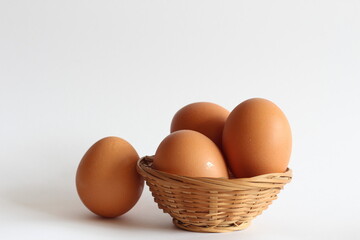 Group of eggs in a wicker basket
