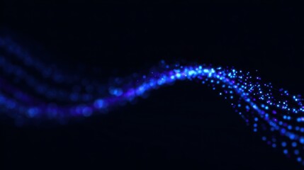 A blue wave of light with many small blue dots