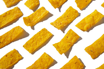 Group of crispy corn tortilla nachos chips isolated on white background clipping path. Snack...