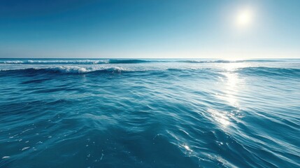 Fototapeta premium Calm ocean waves under a bright sun