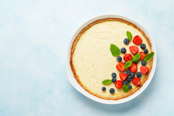 Cheesecake with fresh berries or tart with cheese.