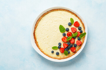 Cheesecake with fresh berries or tart with cheese.