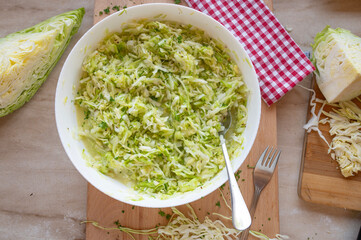 Traditional old fashioned german coleslaw fresh and homemade prepared in a bowl