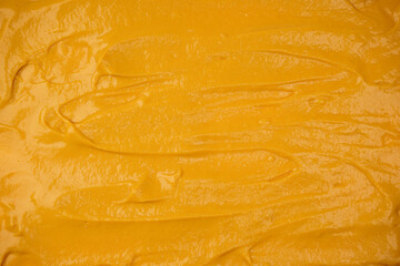 Yellow sauce splashes as a background.