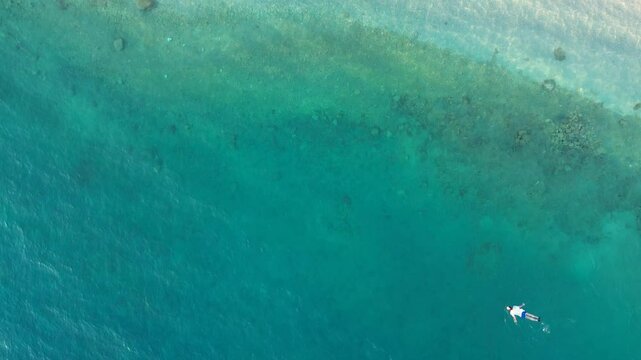 4K Drone Close-Up Flight Over Brela Beach Shoreline, Croatia