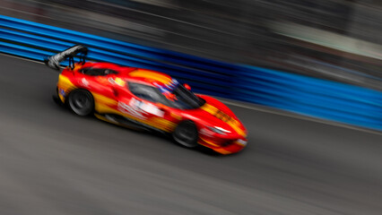 Motion blur race car racing on speed track, Motion blurred super car race on street track circuit, Automobile automotive transportation vehicle background,