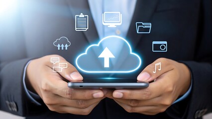 Businessman using smartphone with glowing cloud technology icons for data upload storage communication and media sharing