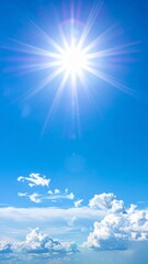 Bright Sun and Fluffy White Clouds in a Vivid Blue Sky