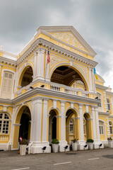 Elegant colonial-style Penang Town Hall in George Town, Malaysia, a historic white building surrounded by greenery, symbol of British-era architecture and heritage.