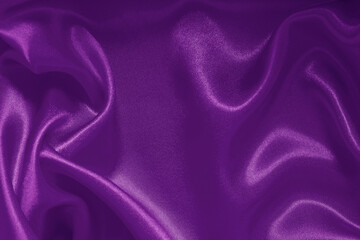 Dark purple fabric texture background, detail of silk or linen pattern.