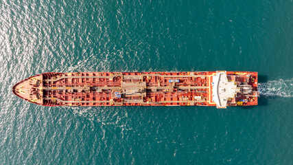 Aerial view of big oil, chemical tanker sails. Tanker ship logistic and transportation business oil and gas industry.