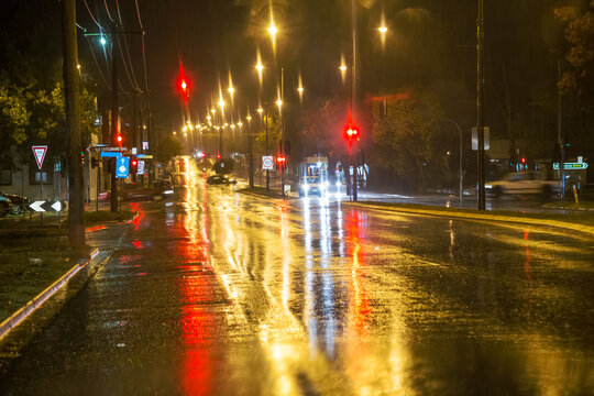 Bright light reflections on a rainy night