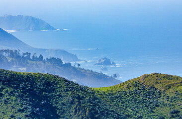 Coastal view from Soberanes Canyon Trailhead in Garrapata State Park along Highway 1. Rolling green...
