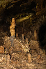 Stunning view of the New Athos stalactite cave in Abkhazia, Georgia. The limestone formations,...