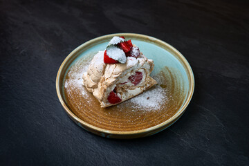 Strawberry meringue roulade with whipped cream