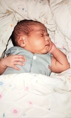 Adorable Newborn Baby Sleeping Peacefully in Bed, Resting, Sweet Dream, Calm