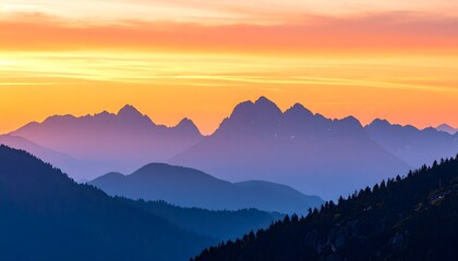 Fototapeta premium Jagged Peaks Glow Orange Purple Blue mountain sunset