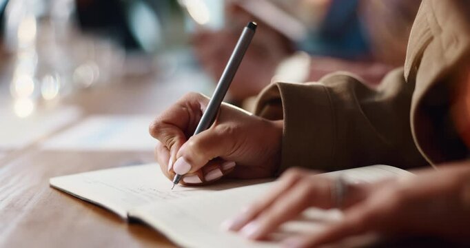 Hands, business and woman in meeting, writing and planning with creative project, edit or deadline. Person, employees and journalist in workplace, pen and notebook for ideas, proposal and feedback