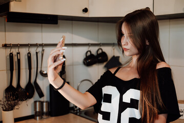 girl with long hair in the kitchen