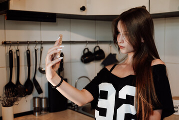 girl with long hair in the kitchen