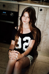 girl with long hair in the kitchen