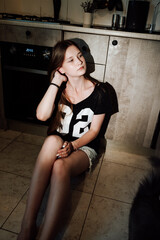 girl with long hair in the kitchen
