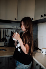 girl with long hair in the kitchen