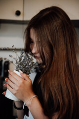 girl with long hair in the kitchen