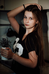 girl with long hair in the kitchen