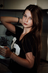 girl with long hair in the kitchen