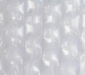 plastic bubble overlay texture of realistic crumpled transparent plastic on transparent background, plastic effect overlay..