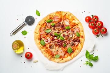 Delicious meat pizza with ham, salami and sausages.