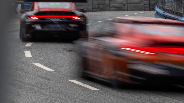 Motion blur race car racing on speed track, Motion blurred super car race on street track circuit, Automobile automotive transportation vehicle background,