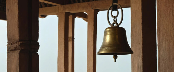 Isolated image of a brass bell (ghanta) used in temples.

