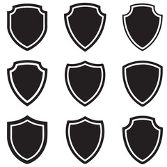 Set of vector various style shields. Shield icon vector, black silhouettes	