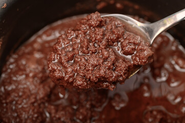 Ugly, unappetizing, spoiled by chocolate icing, stratified into prime factors, curdled chocolate,
