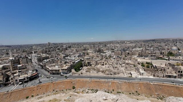 Panoramic View of Ancient City with Ruins and Modern Buildings. Aleppo city, Syria.