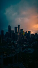 Dramatic Chicago skyline at dusk with colorful clouds and city lights
