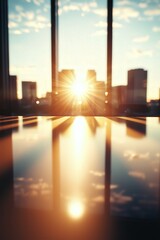 A bright sunrise shines through a window overlooking a city skyline, casting warm light and reflections on a smooth surface inside.
