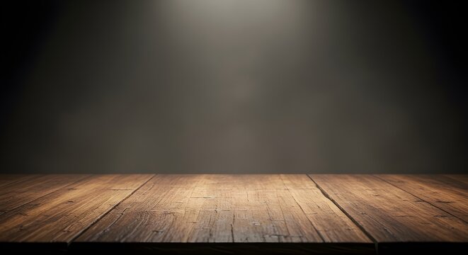 mesa de madera vac&iacute;a con humo flotante sobre fondo oscuro