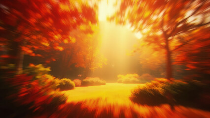 Obraz premium Autumnal landscape with blurred effect showcasing warm orange and yellow hues of trees and foliage with bright sunlight