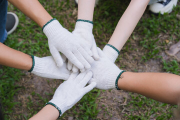 Hands in Gloves Stacked Together