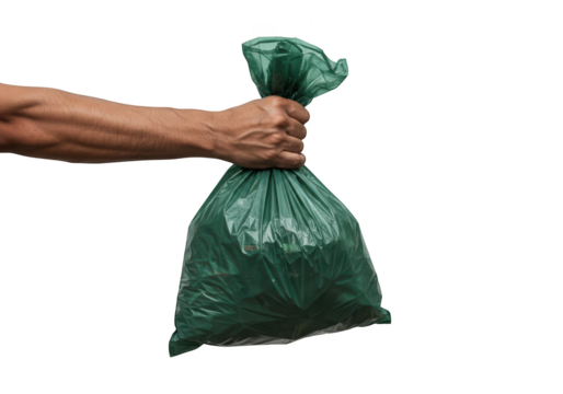 Hand holding a full green trash bag tied with a knot showcasing waste disposal and recycling efforts