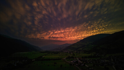 beautiful colorful sunset over the mountains in the hohen tauern national park in austria, at a summer evening