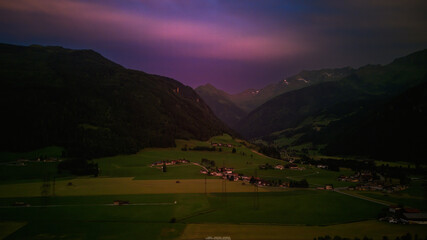 beautiful colorful sunset over the mountains in the hohen tauern national park in austria, at a summer evening