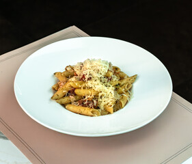 Penne Arrabiata Pasta with Parmesan and Basil. Classic Italian comfort food perfect for restaurant menus, food blogs, and delivery platforms.