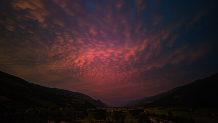 beautiful colorful sunset over the mountains in the hohen tauern national park in austria, at a summer evening